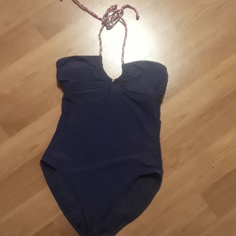Blue one piece swim suit.